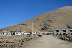 03 Passing Through A Tibetan Village On the Tingri Plain Driving From Tingri To Mount Everest North Base Camp In Tibet.jpg